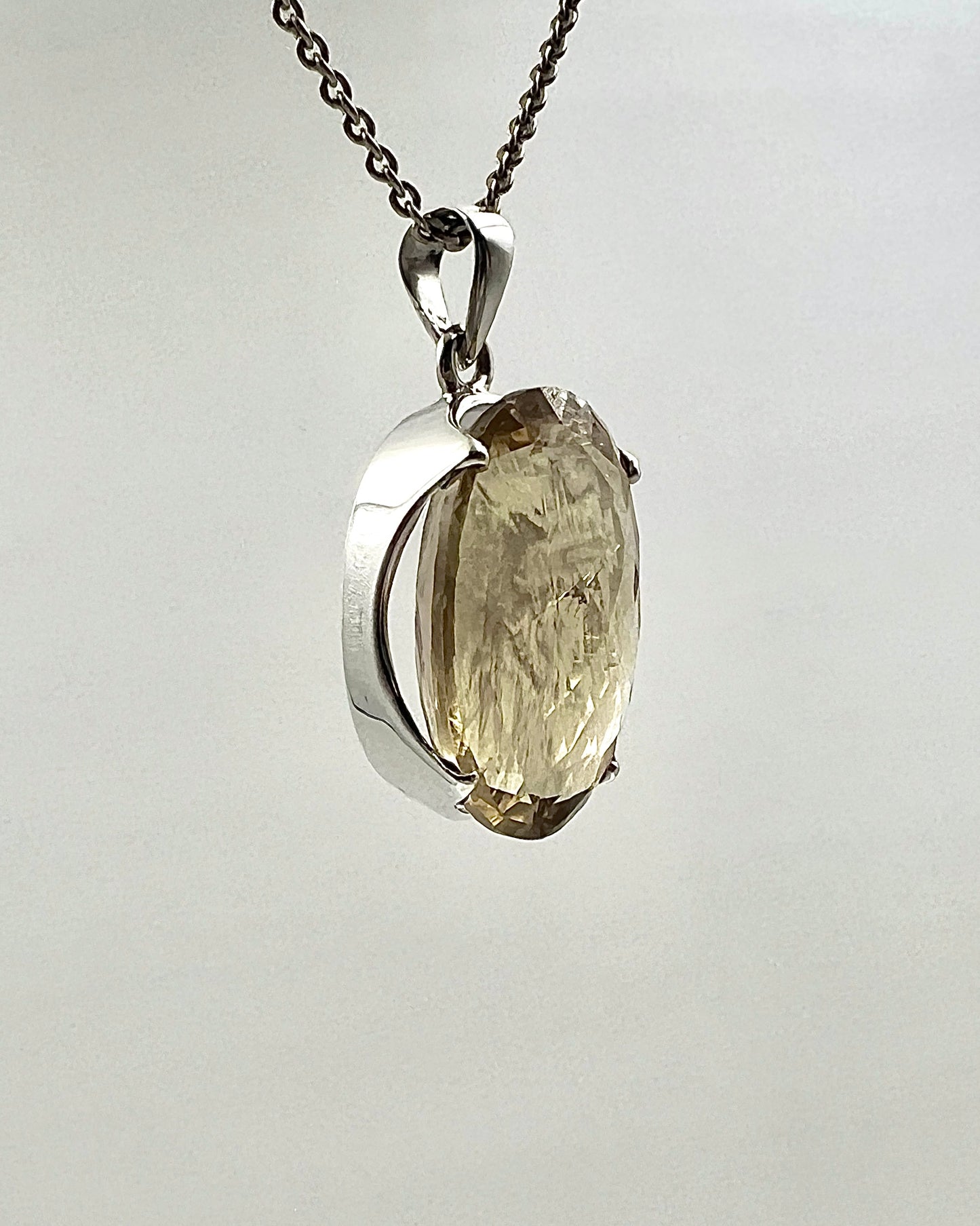 Facetted South Indian ( Karur) Yellow Scapolite with Natural Oil Base Biotite Inclusions in .925 Silver Setting