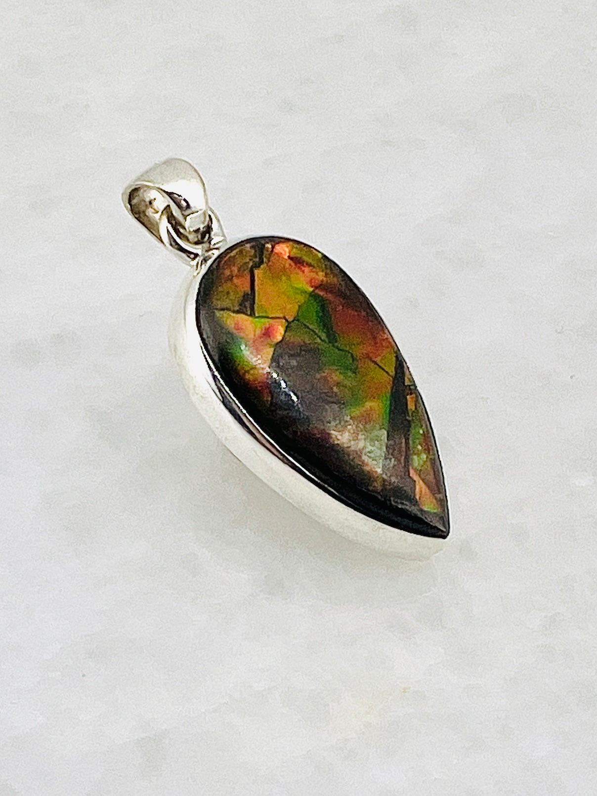 Ammolite (Fossilzed Shells) in 0.925 Silver