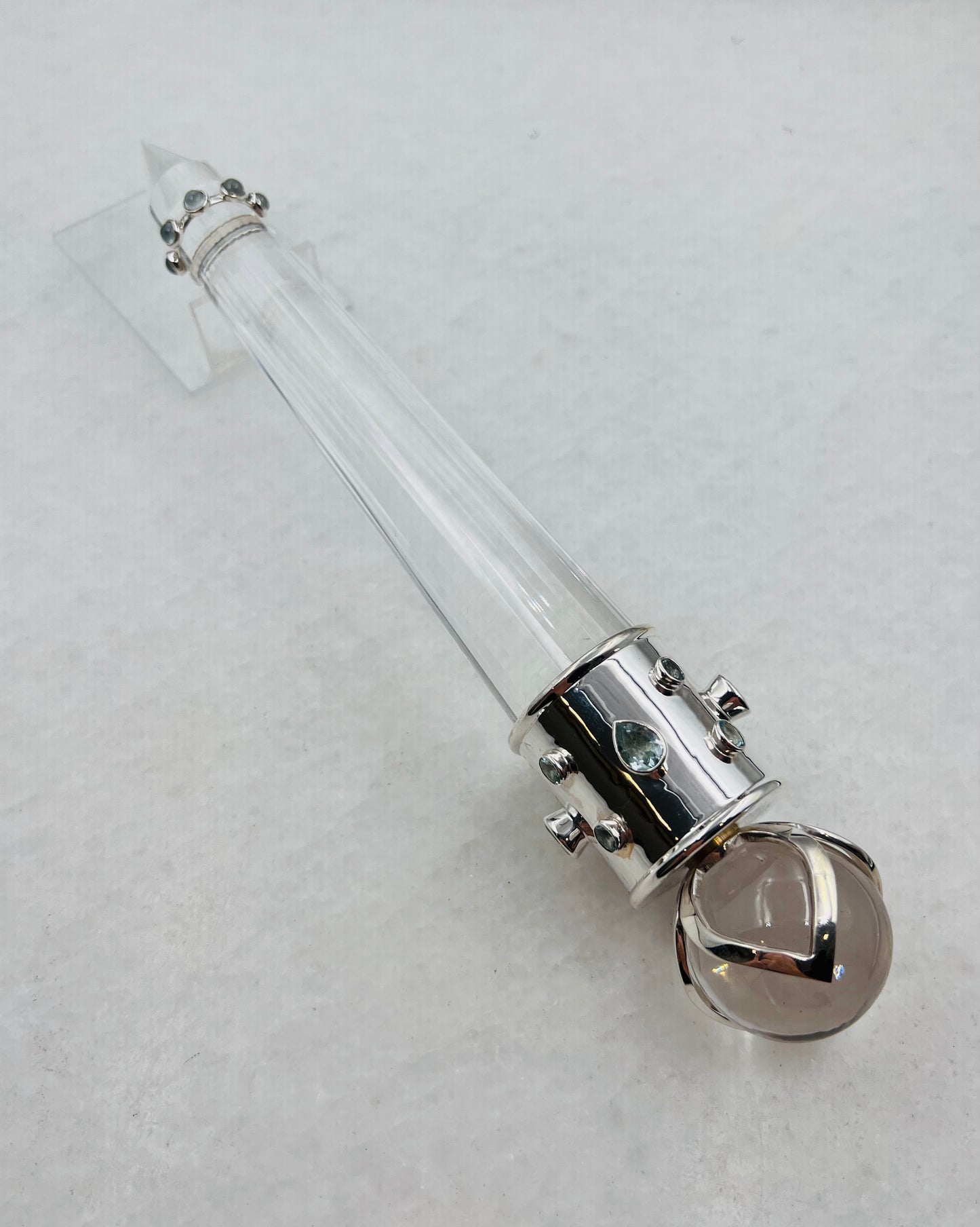 Baguette en cristal Vogel aigue-marine sertie de 3 sphères de lotus ouvertes