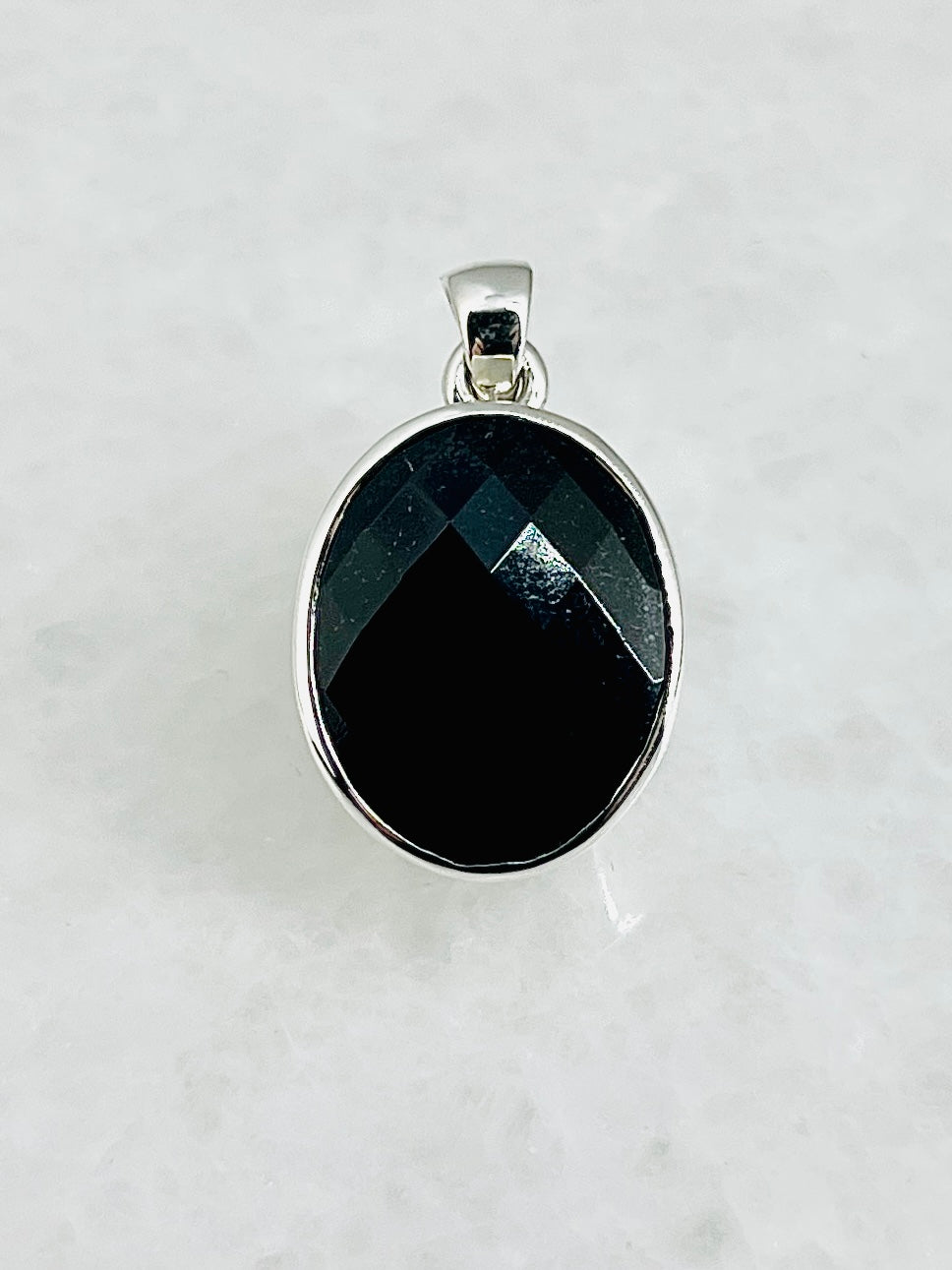 Top Facetted Black Turmaline in .925 Silver Setting