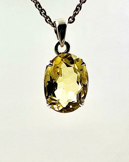 Facetted South Indian ( Karur) Yellow Scapolite  with Natural Oil Base Biotite Inclusions in .925 Silver Setting