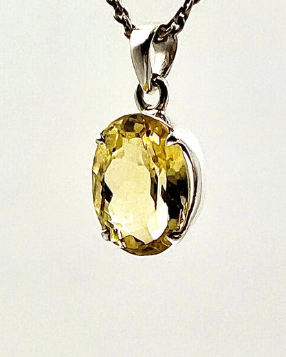 Facetted South Indian ( Karur) Yellow Scapolite  with Natural Oil Base Biotite Inclusions in .925 Silver Setting
