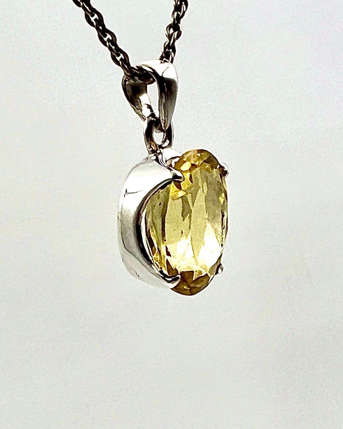 Facetted South Indian ( Karur) Yellow Scapolite  with Natural Oil Base Biotite Inclusions in .925 Silver Setting