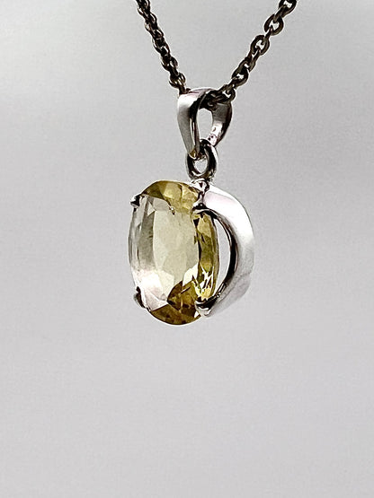 Facetted South Indian ( Karur) Yellow Scapolite  with Natural Oil Base Biotite Inclusions in .925 Silver Setting