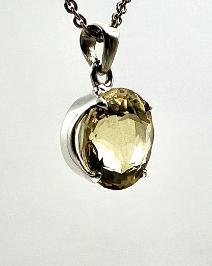 Facetted South Indian ( Karur) Yellow Scapolite  with Natural Oil Base Biotite Inclusions in .925 Silver Setting
