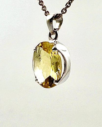 Facetted South Indian ( Karur) Yellow Scapolite  with Natural Oil Base Biotite Inclusions in .925 Silver Setting