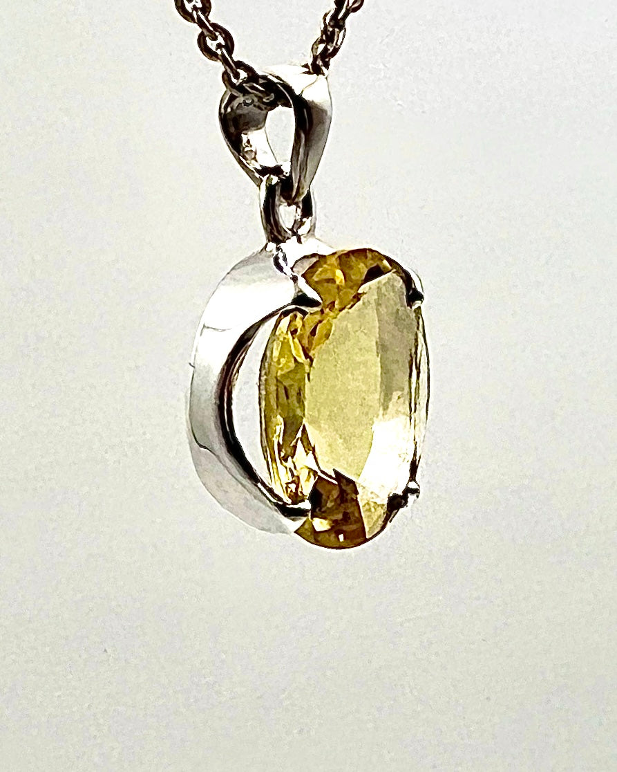 Facetted South Indian ( Karur) Yellow Scapolite  with Natural Oil Base Biotite Inclusions in .925 Silver Setting