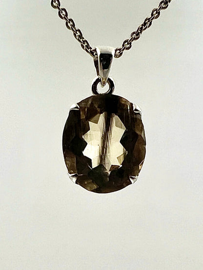 Facetted South Indian ( Karur) Yellow Scapolite  with Natural Oil Base Biotite Inclusions in .925 Silver Setting