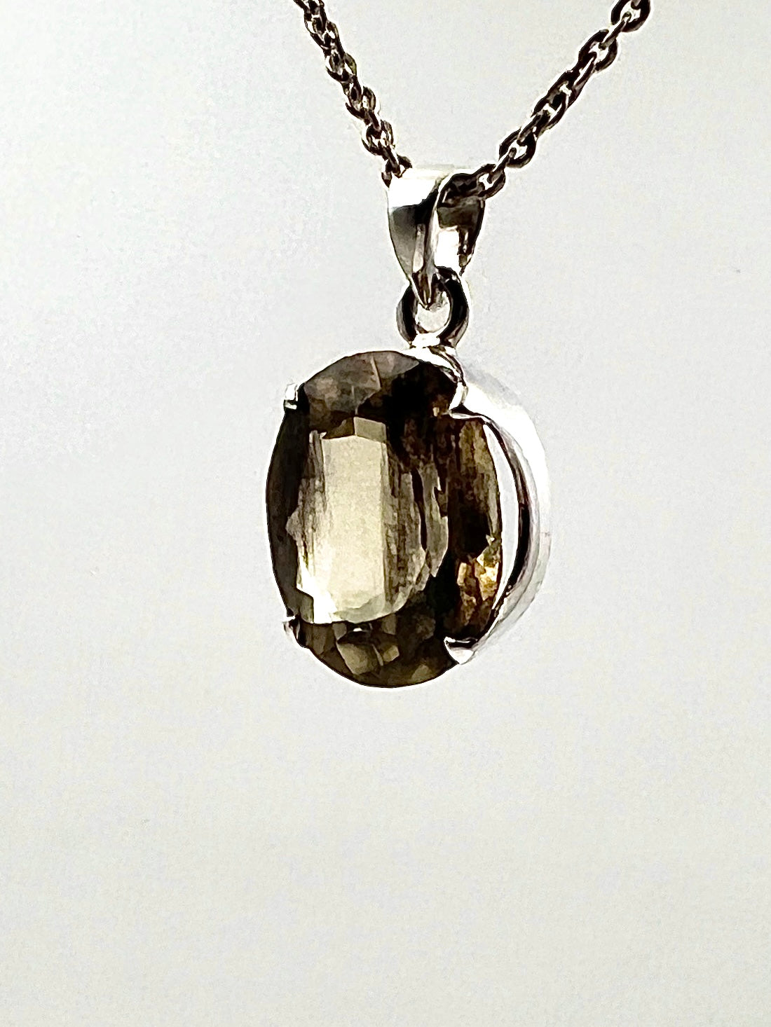 Facetted South Indian ( Karur) Yellow Scapolite  with Natural Oil Base Biotite Inclusions in .925 Silver Setting