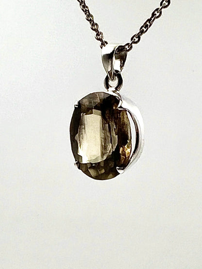 Facetted South Indian ( Karur) Yellow Scapolite  with Natural Oil Base Biotite Inclusions in .925 Silver Setting