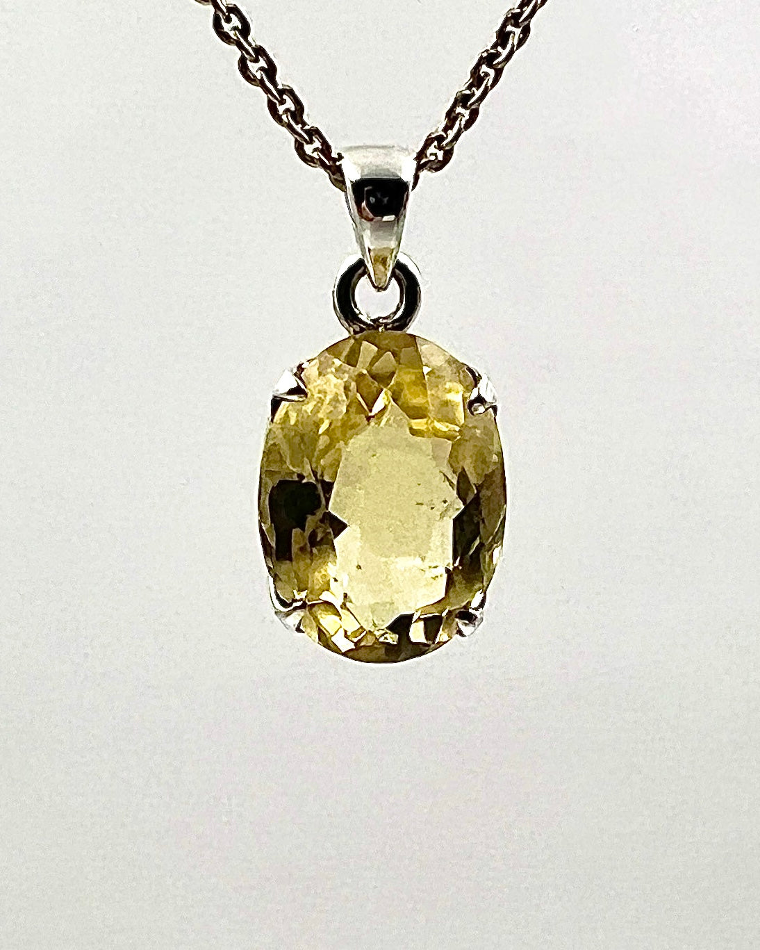 Facetted South Indian ( Karur) Yellow Scapolite  with Natural Oil Base Biotite Inclusions in .925 Silver Setting