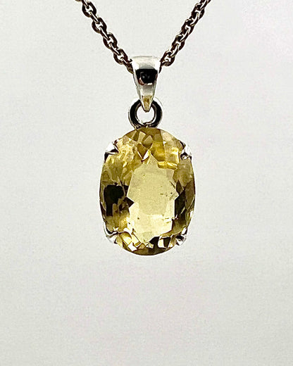 Facetted South Indian ( Karur) Yellow Scapolite  with Natural Oil Base Biotite Inclusions in .925 Silver Setting