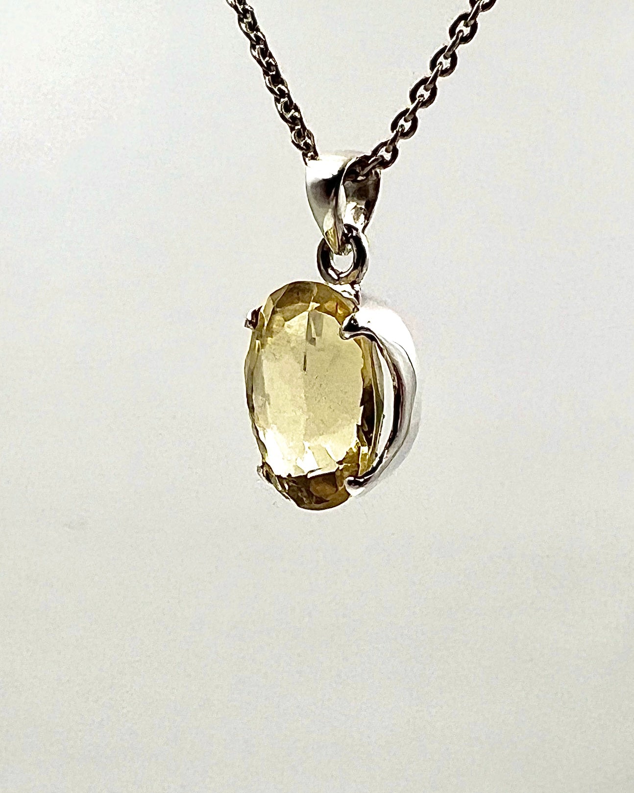 Facetted South Indian ( Karur) Yellow Scapolite  with Natural Oil Base Biotite Inclusions in .925 Silver Setting
