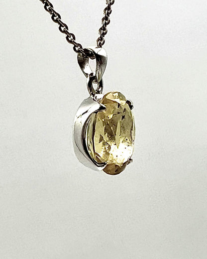 Facetted South Indian ( Karur) Yellow Scapolite  with Natural Oil Base Biotite Inclusions in .925 Silver Setting