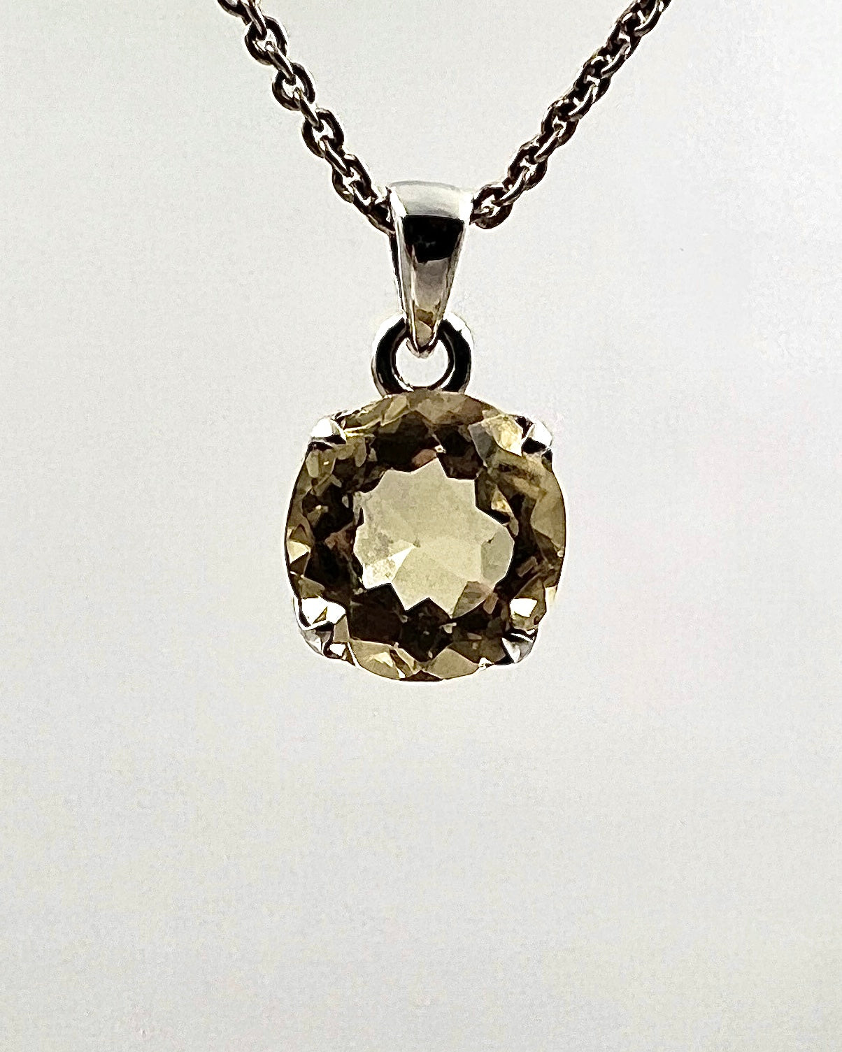 Facetted South Indian ( Karur) Yellow Scapolite  with Natural Oil Base Biotite Inclusions in .925 Silver Setting