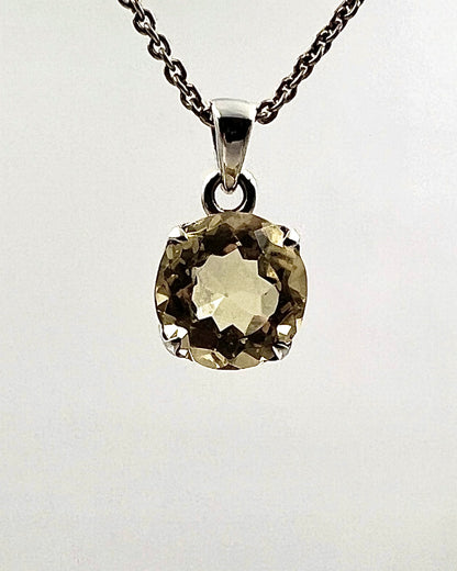 Facetted South Indian ( Karur) Yellow Scapolite  with Natural Oil Base Biotite Inclusions in .925 Silver Setting