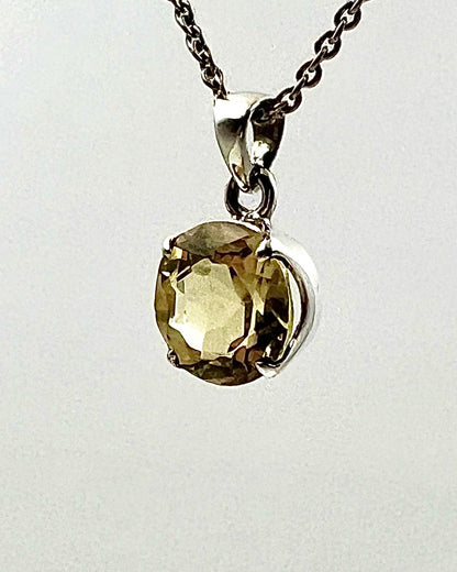 Facetted South Indian ( Karur) Yellow Scapolite  with Natural Oil Base Biotite Inclusions in .925 Silver Setting