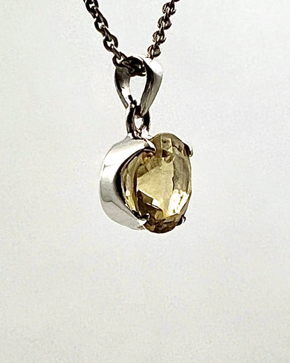 Facetted South Indian ( Karur) Yellow Scapolite  with Natural Oil Base Biotite Inclusions in .925 Silver Setting