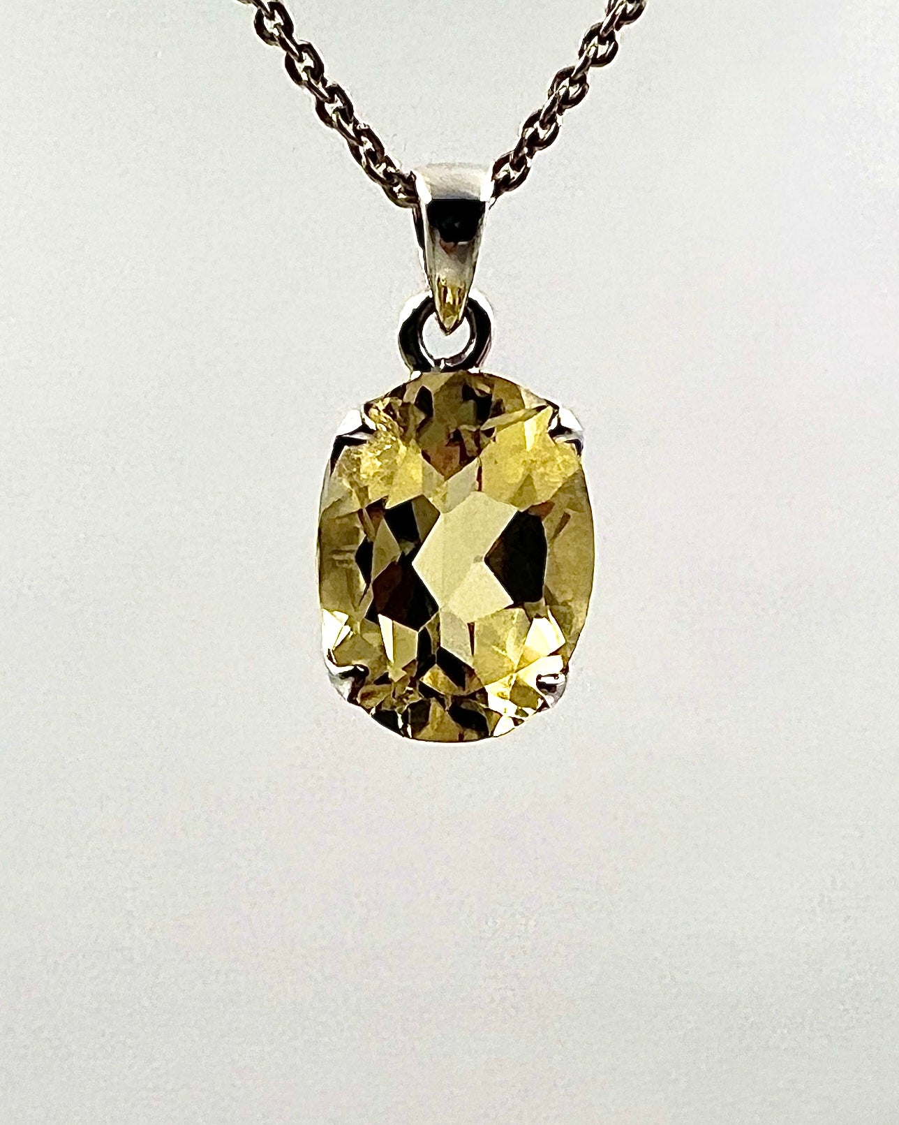 Facetted South Indian ( Karur) Yellow Scapolite  with Natural Oil Base Biotite Inclusions in .925 Silver Setting
