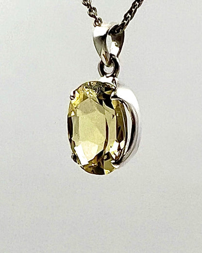Facetted South Indian ( Karur) Yellow Scapolite  with Natural Oil Base Biotite Inclusions in .925 Silver Setting