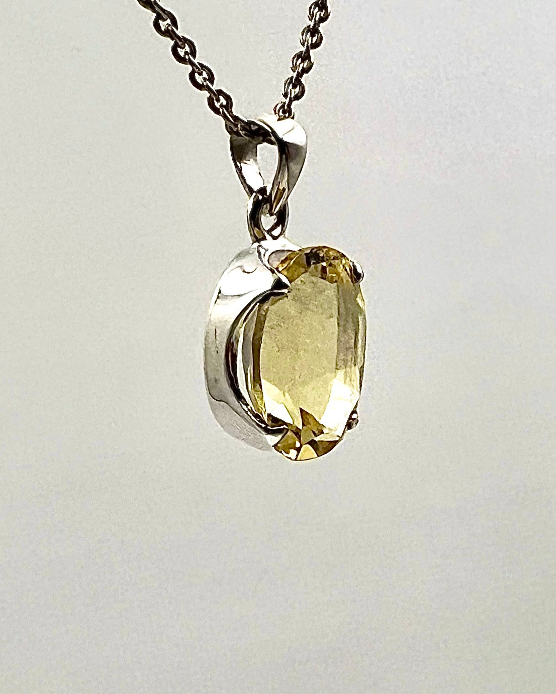 Facetted South Indian ( Karur) Yellow Scapolite  with Natural Oil Base Biotite Inclusions in .925 Silver Setting