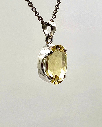 Facetted South Indian ( Karur) Yellow Scapolite  with Natural Oil Base Biotite Inclusions in .925 Silver Setting