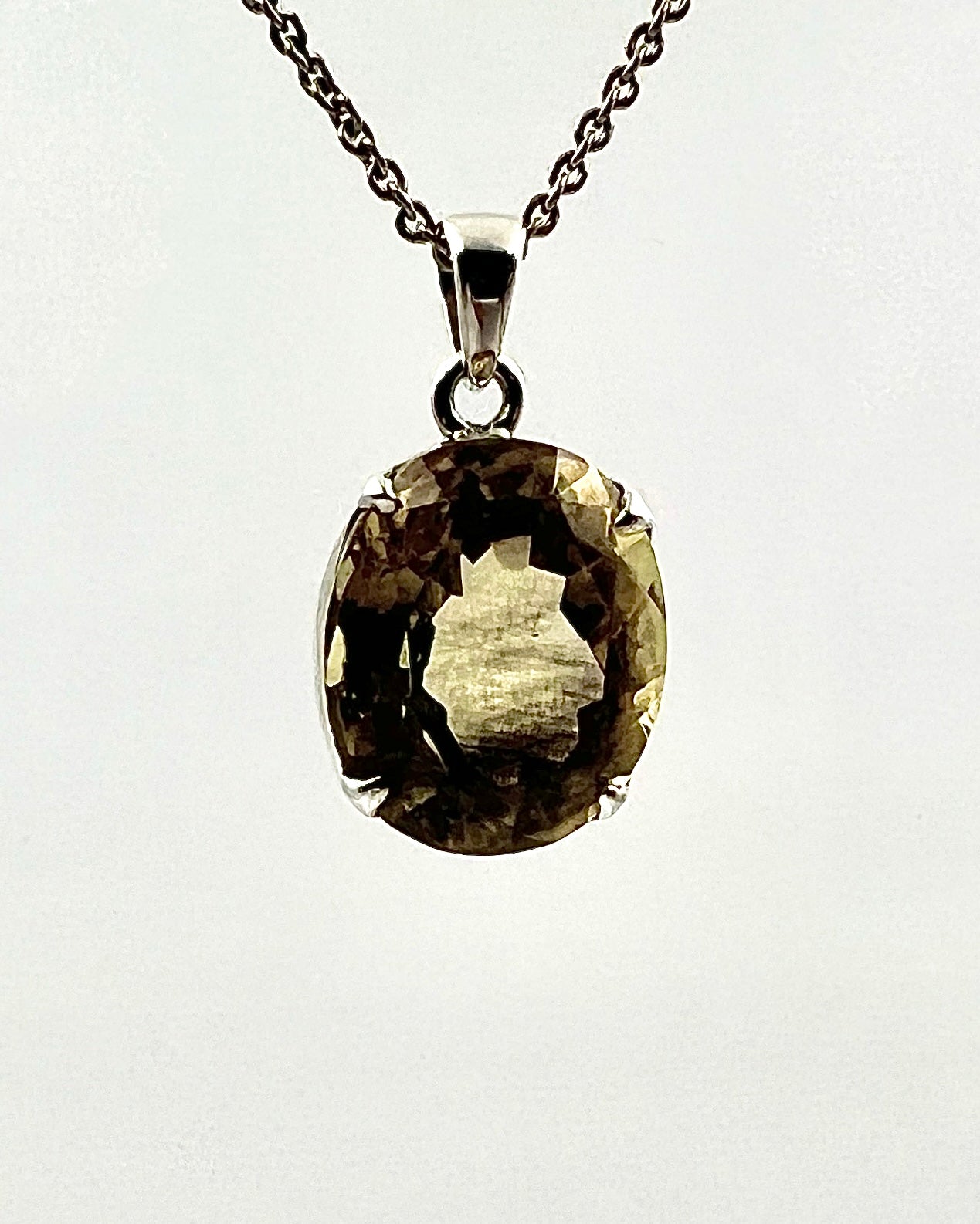 Facetted South Indian ( Karur) Yellow Scapolite  with Natural Oil Base Biotite Inclusions in .925 Silver Setting