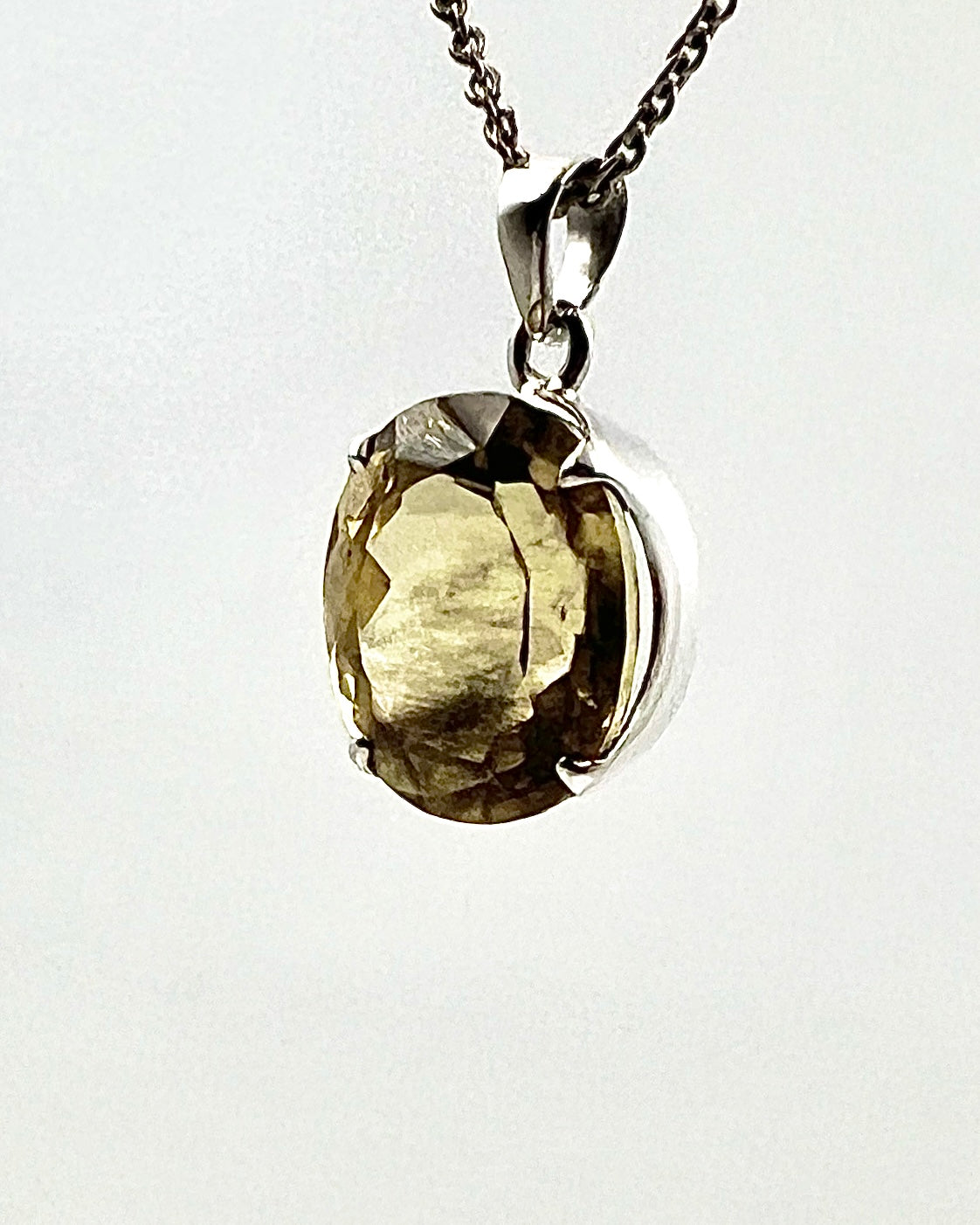 Facetted South Indian ( Karur) Yellow Scapolite  with Natural Oil Base Biotite Inclusions in .925 Silver Setting