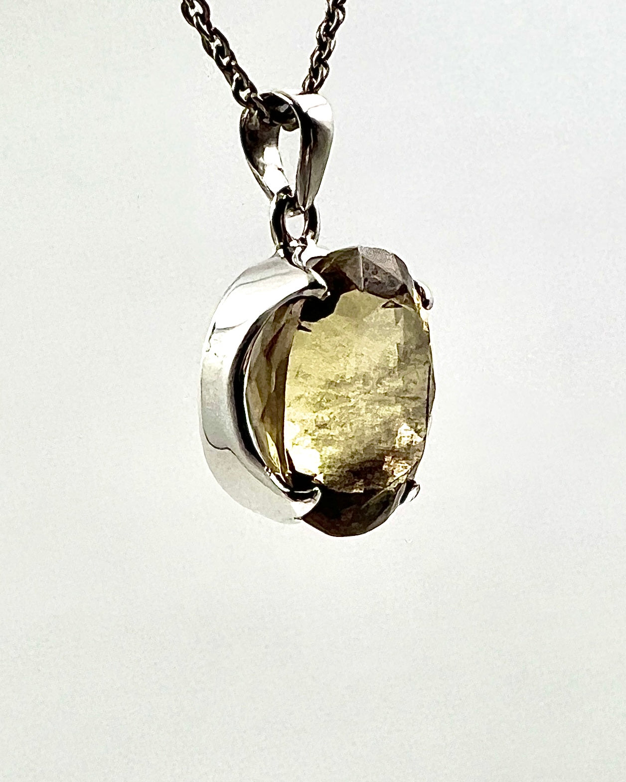 Facetted South Indian ( Karur) Yellow Scapolite  with Natural Oil Base Biotite Inclusions in .925 Silver Setting