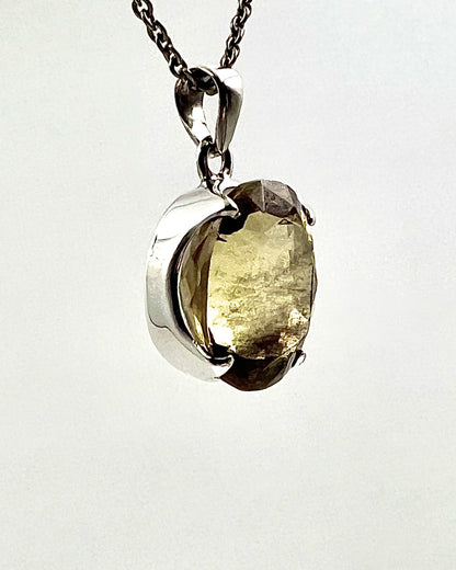 Facetted South Indian ( Karur) Yellow Scapolite  with Natural Oil Base Biotite Inclusions in .925 Silver Setting