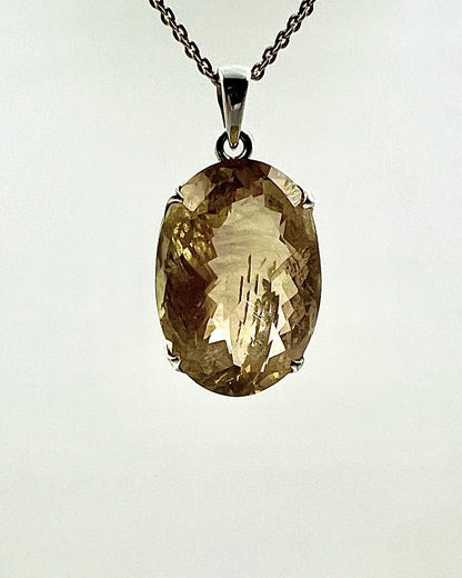 Facetted South Indian ( Karur) Yellow Scapolite  with Natural Oil Base Biotite Inclusions in .925 Silver Setting