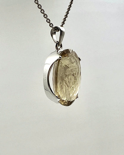 Facetted South Indian ( Karur) Yellow Scapolite  with Natural Oil Base Biotite Inclusions in .925 Silver Setting