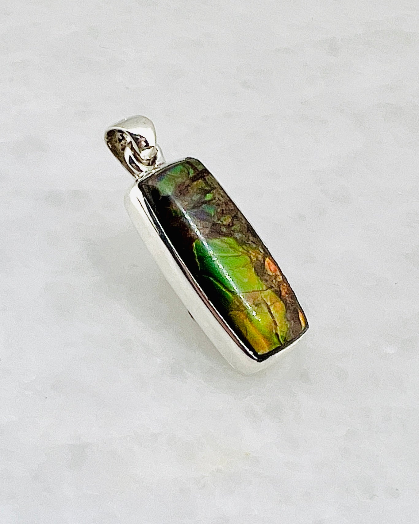 Ammolite (Fossilzed Shells) in 0.925 Silver
