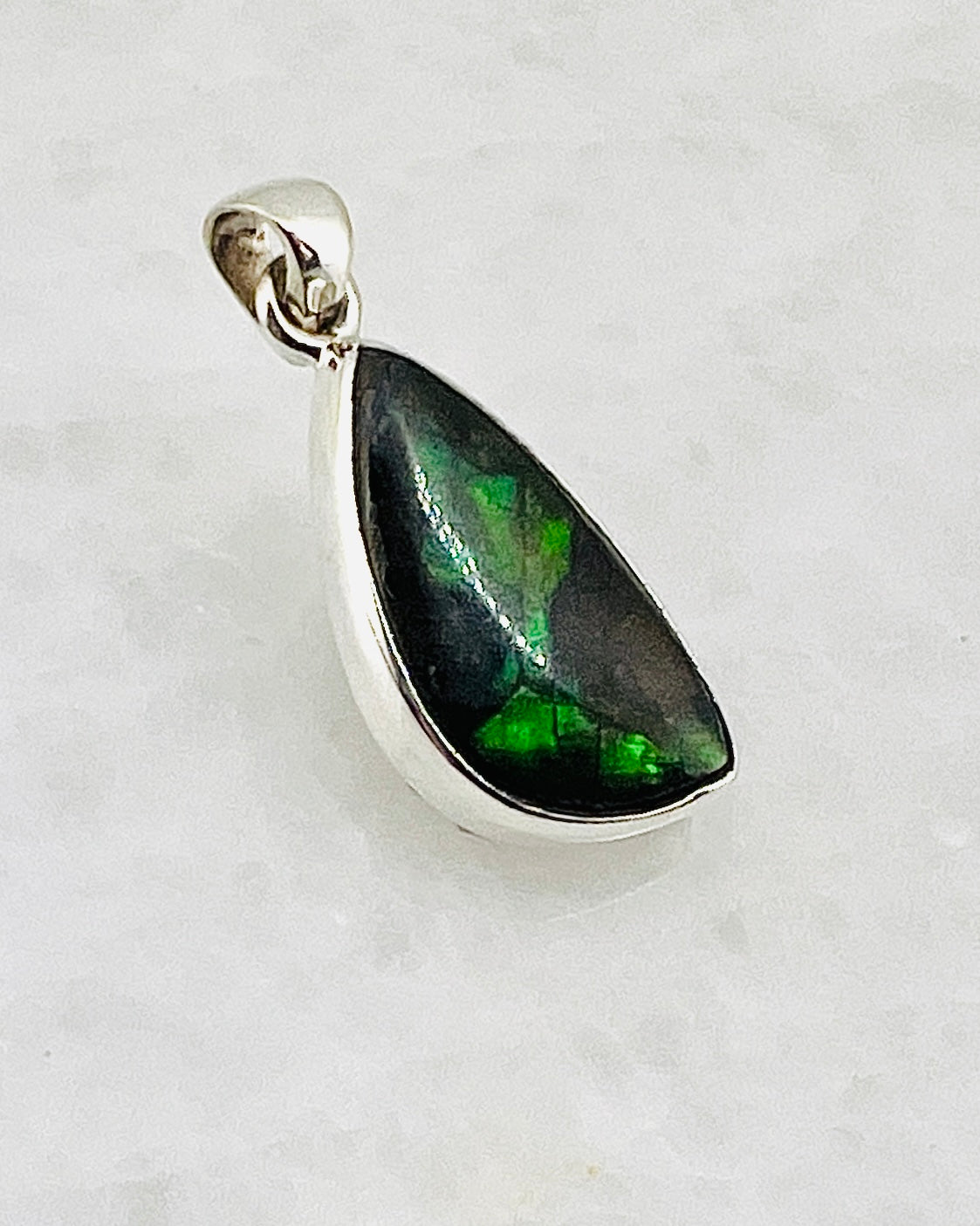 Ammolite (Fossilzed Shells) in 0.925 Silver