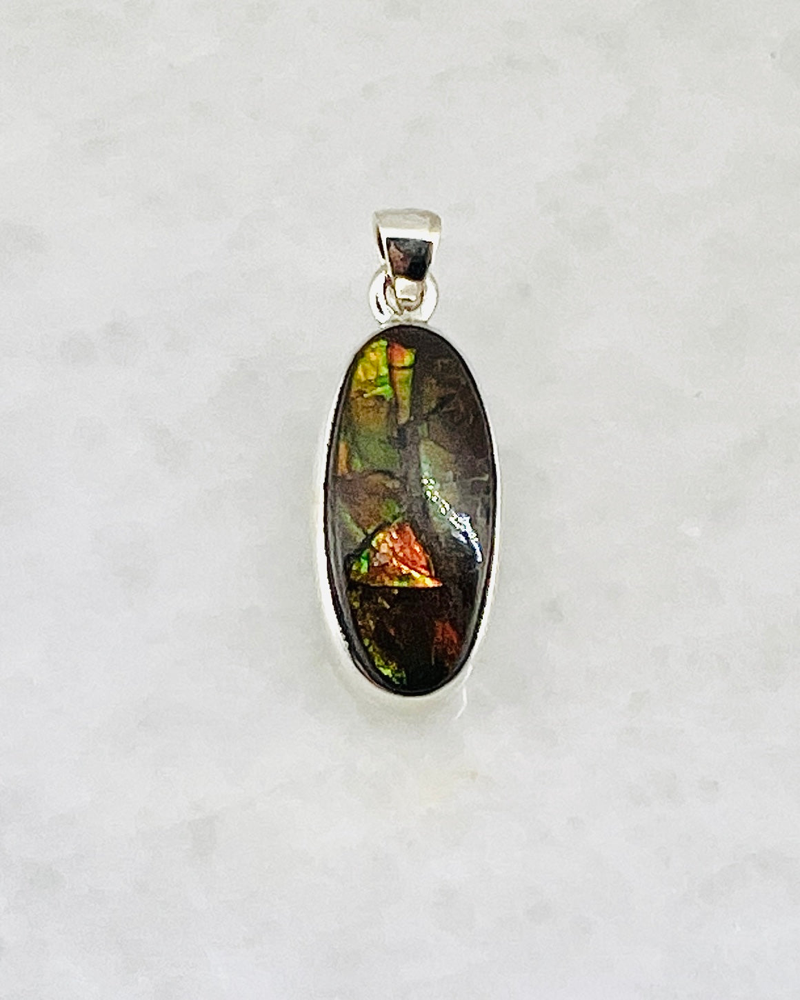 Ammolite (Fossilzed Shells) in 0.925 Silver