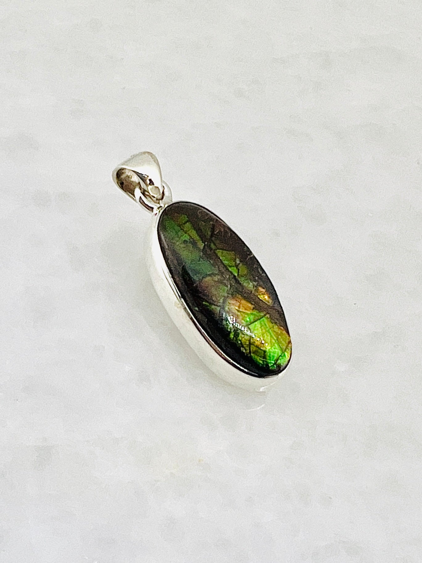 Ammolite (Fossilzed Shells) in 0.925 Silver