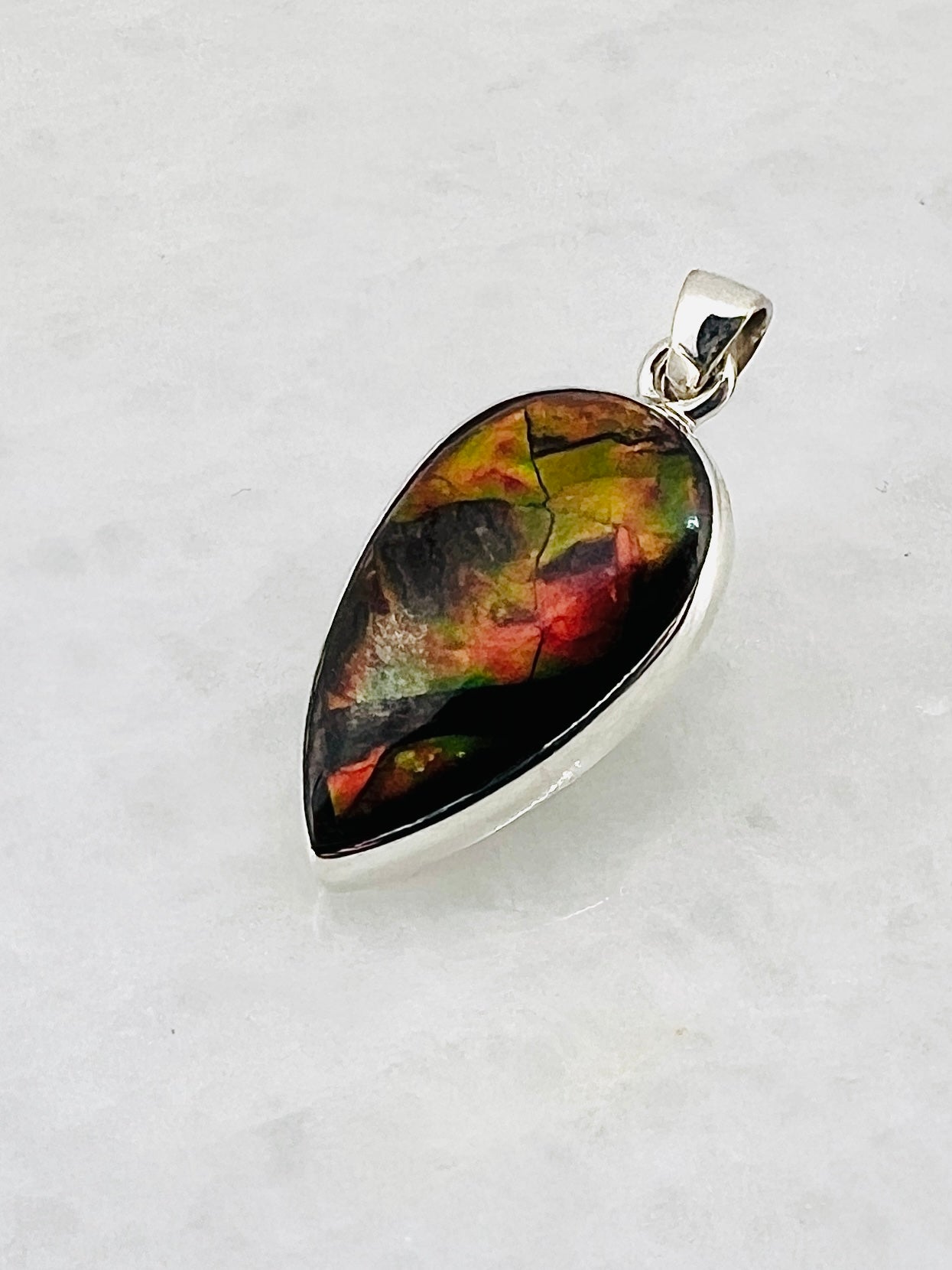 Ammolite (Fossilzed Shells) in 0.925 Silver