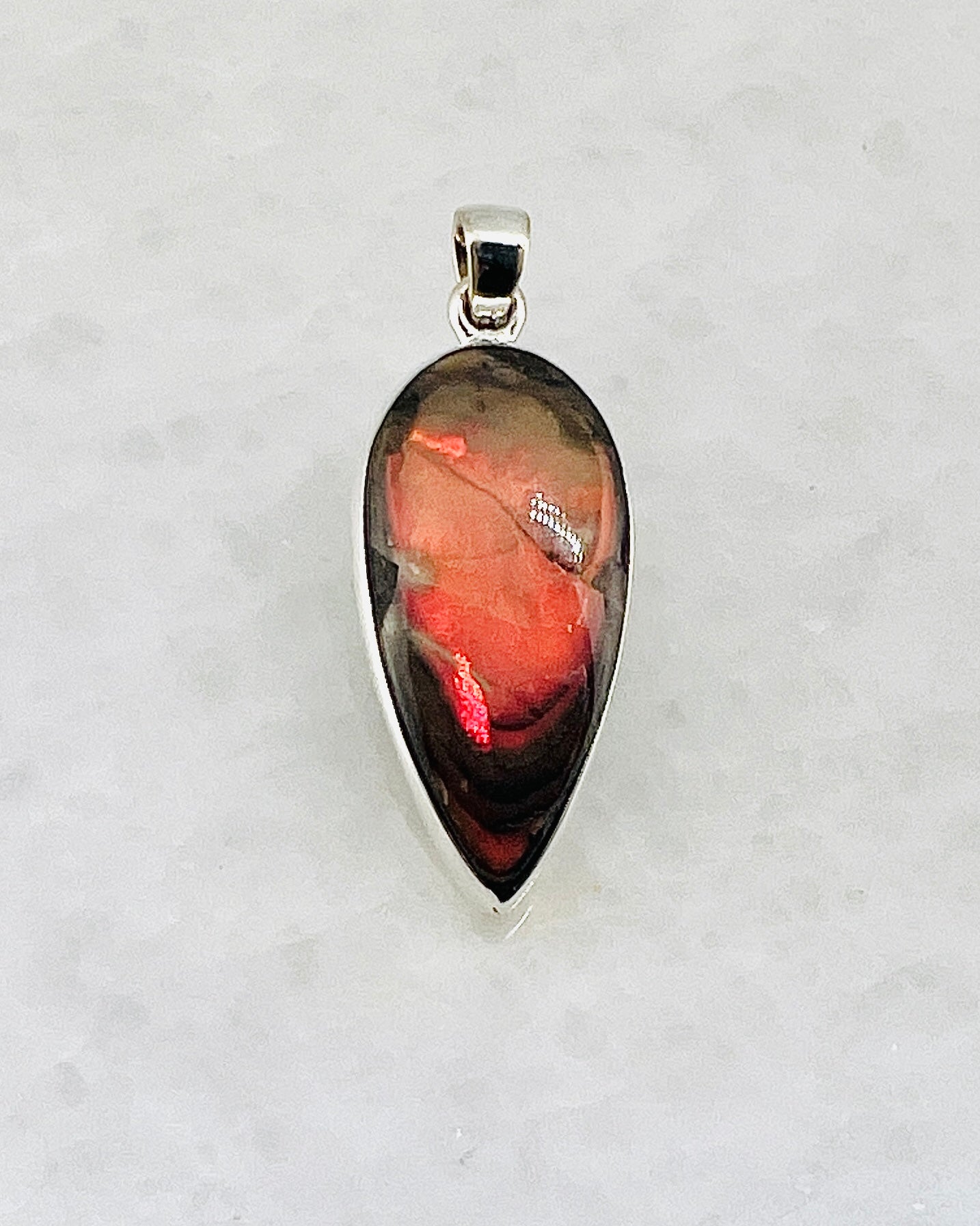 Ammolite (Fossilzed Shells) in 0.925 Silver