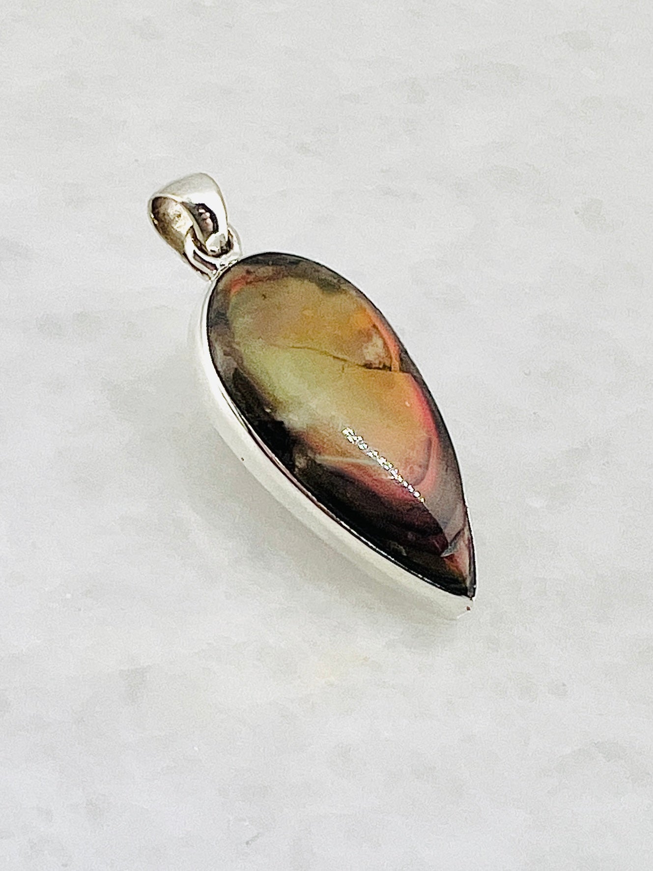 Ammolite (Fossilzed Shells) in 0.925 Silver