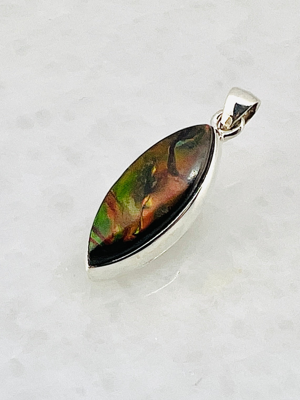 Ammolite (Fossilzed Shells) in 0.925 Silver