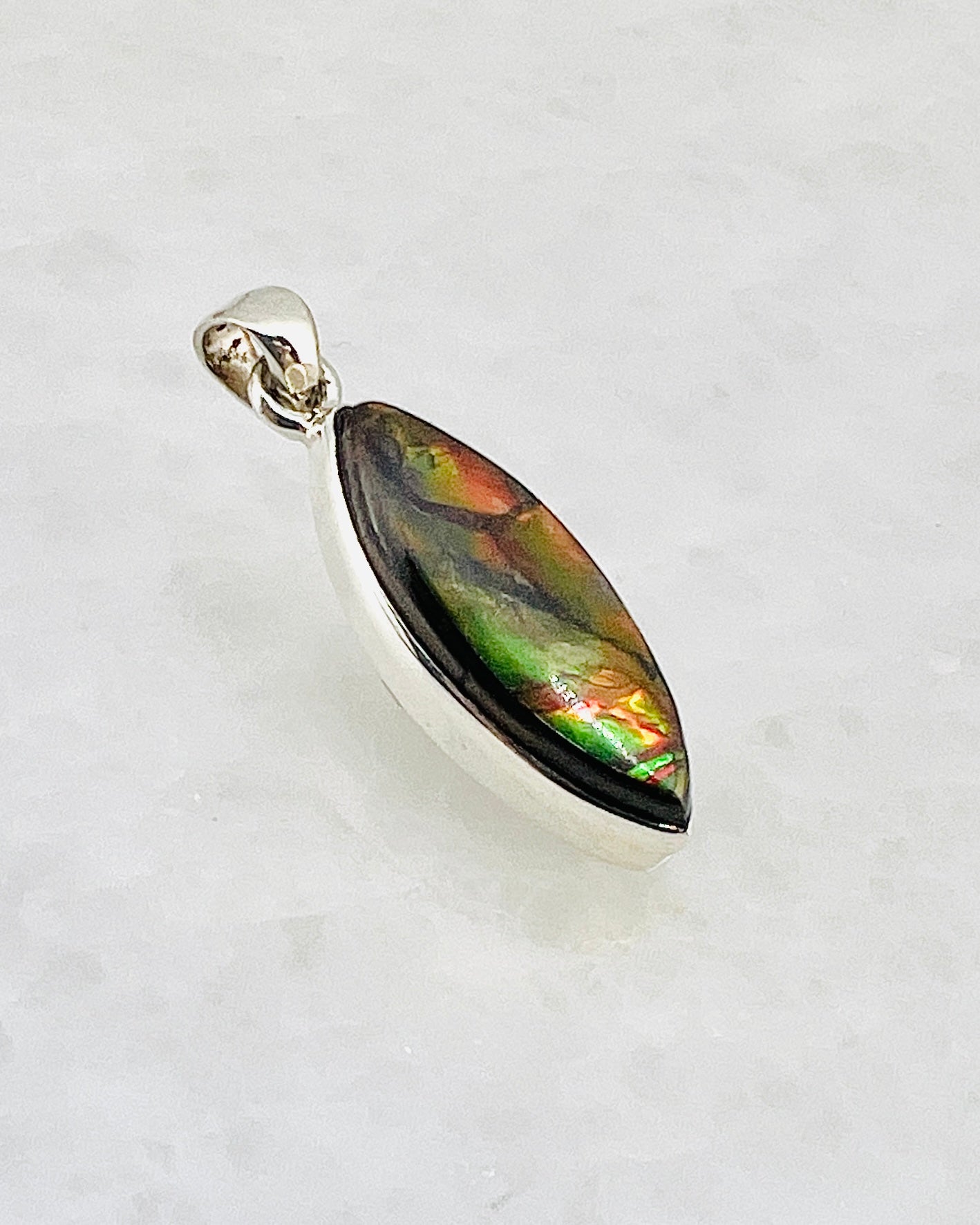 Ammolite (Fossilzed Shells) in 0.925 Silver