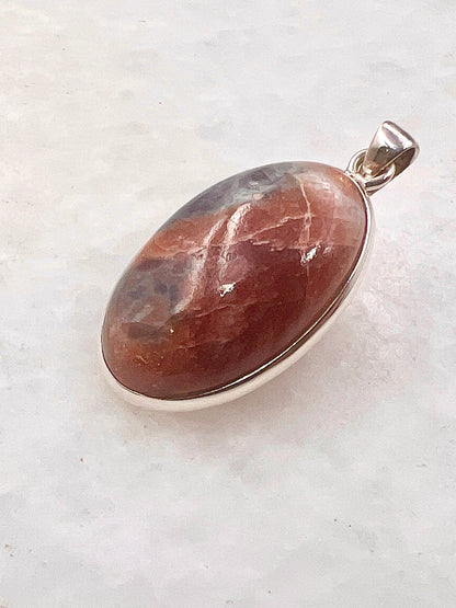Natural Iolite Sunstone (India) in 0.925 Silver