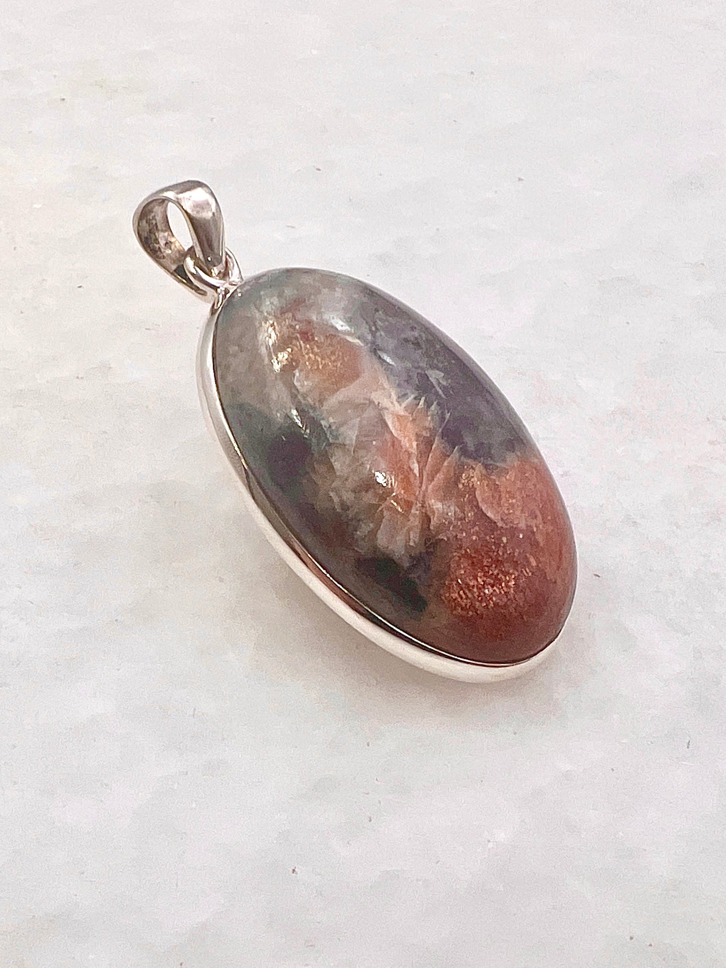 Natural Iolite Sunstone (India) in 0.925 Silver