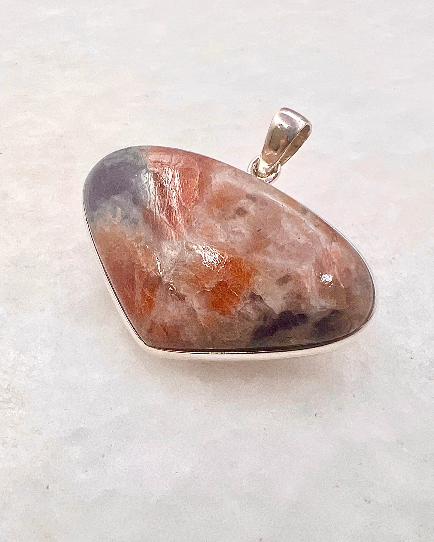 Natural Iolite Sunstone (India) in 0.925 Silver