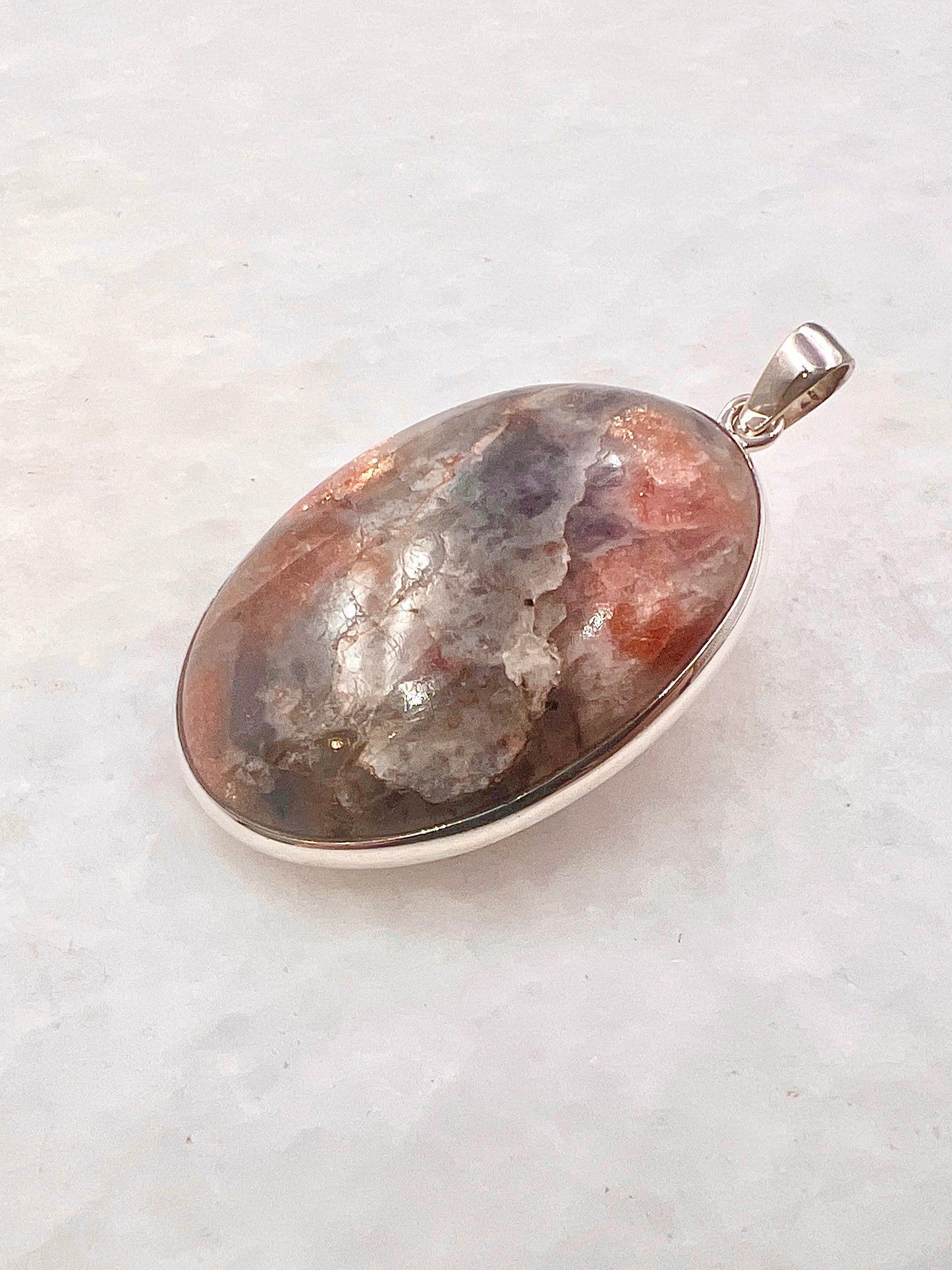 Natural Iolite Sunstone (India) in 0.925 Silver