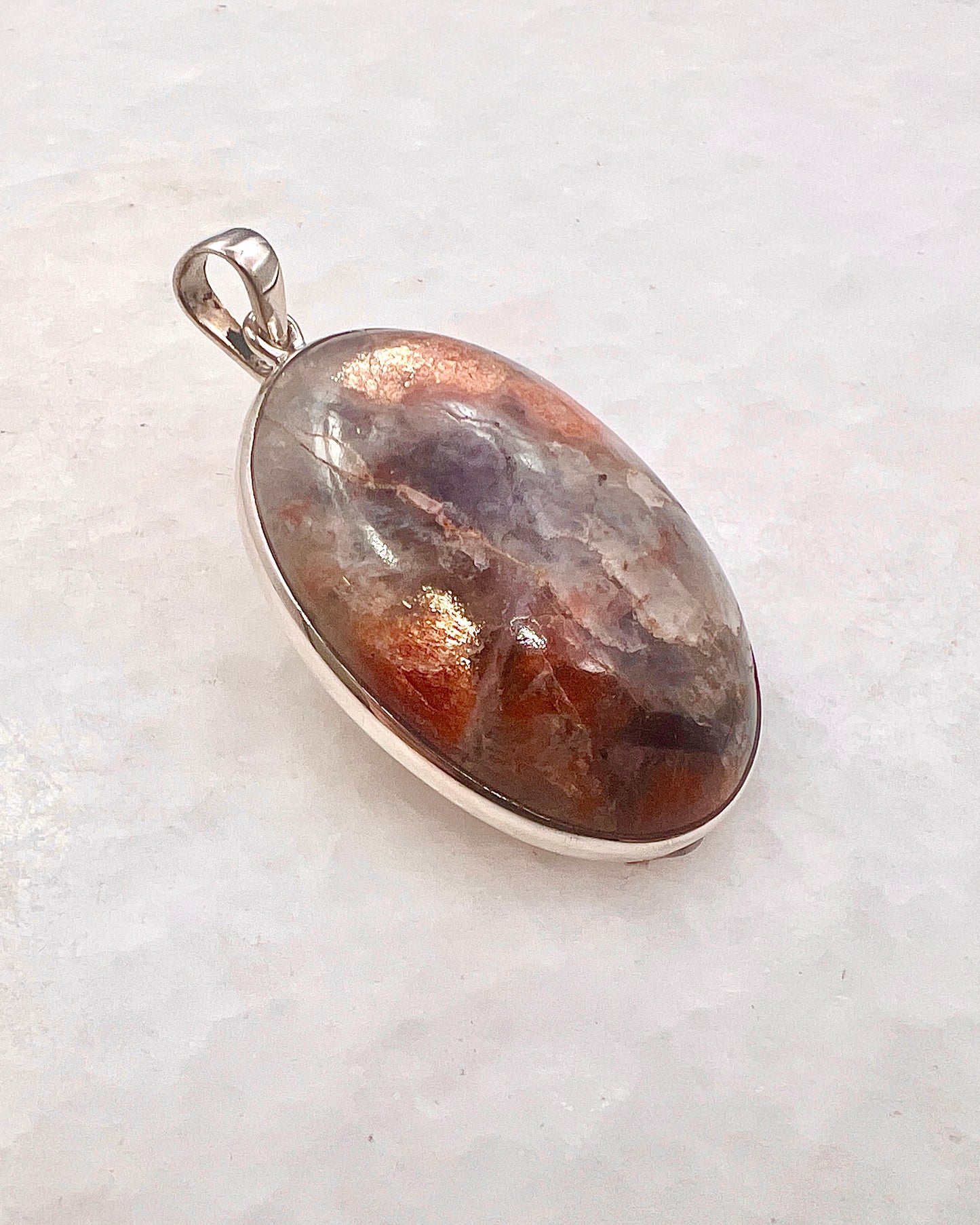 Natural Iolite Sunstone (India) in 0.925 Silver
