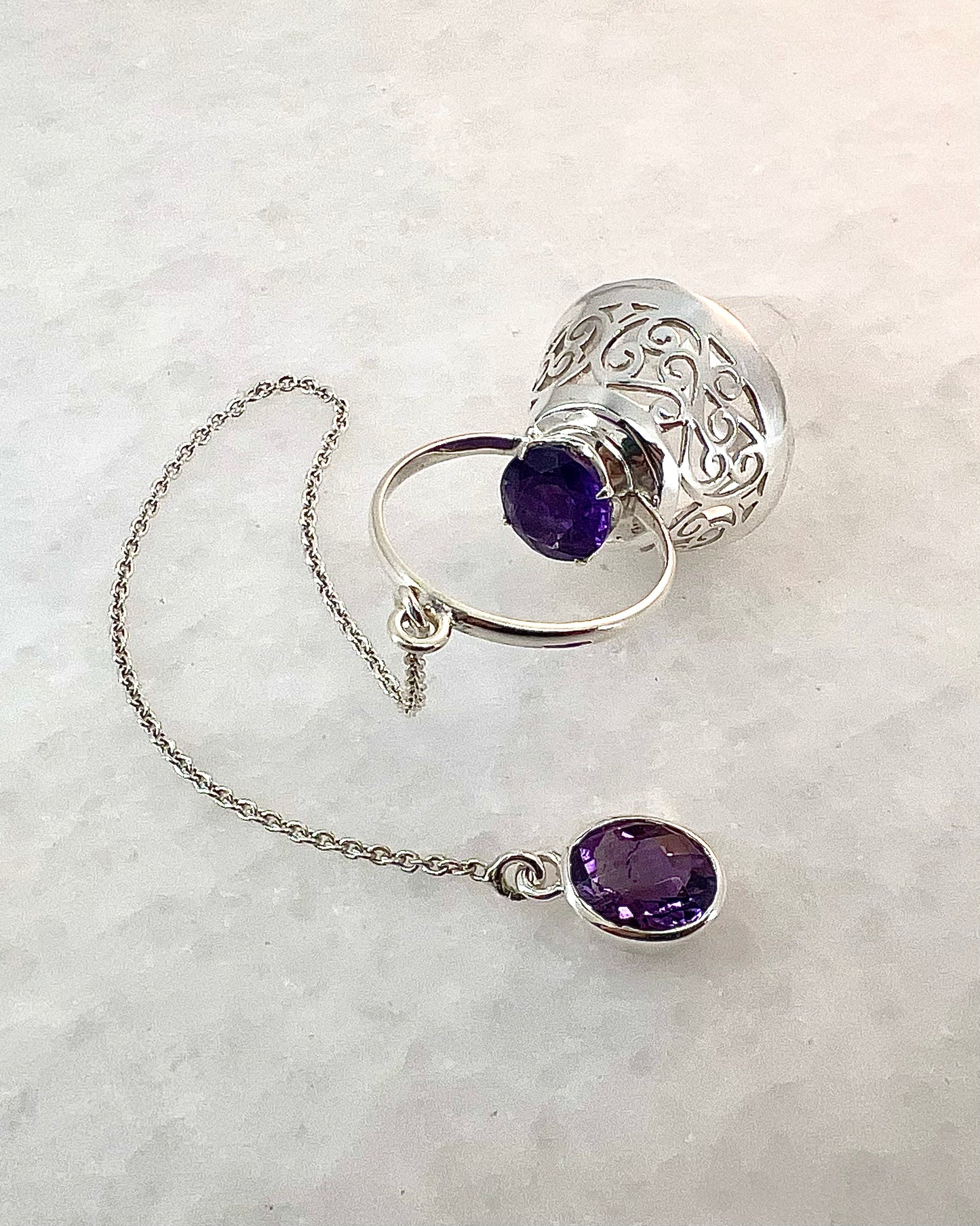 Vogel Cut Crystal Point with Facetted Amethysts in Fancy .925 Silver Setting with Cutwork Design as a Pendulum