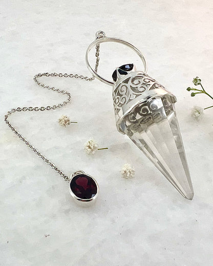 Vogel Cut Crystal Point with Facetted Garnets in Fancy .925 Silver Setting with Cutwork Design as a Pendulum