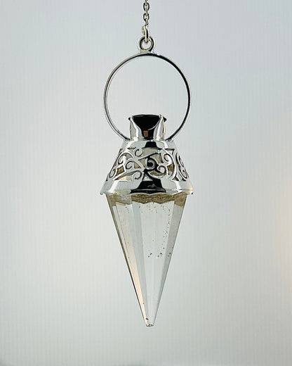 Vogel Cut Crystal Point with Facetted Garnets in Fancy .925 Silver Setting with Cutwork Design as a Pendulum
