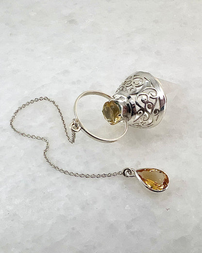 Vogel Cut Crystal Point with Facetted Citrines in Fancy .925 Silver Setting with Cutwork Design as a Pendulum